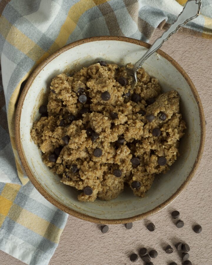An overhead view of a bowl of cookie dough